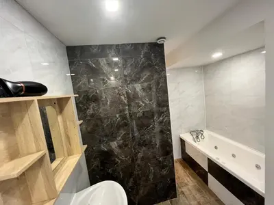 Salle de bains dans l'établissement Maison de Vacances du Bouquet