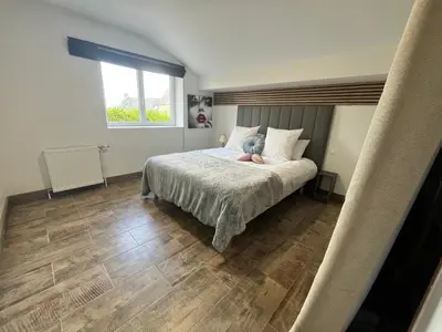 Un ou plusieurs lits dans un hébergement de l'établissement Maison de Vacances du Bouquet