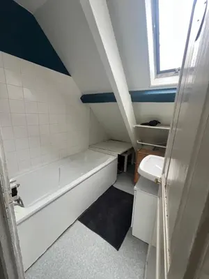 Un ou plusieurs lits dans un hébergement de l'établissement WingFlat Appartement Entier Centre Ville Proche Naval Cité de la mer Quartier Calme