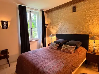 Un ou plusieurs lits dans un hébergement de l'établissement Au Pavillon du Château - Mer & Plage Juno Beach