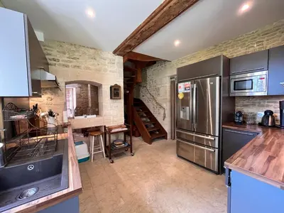 Cuisine ou kitchenette dans l'établissement Au Pavillon du Château - Mer & Plage Juno Beach