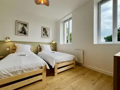 Un ou plusieurs lits dans un hébergement de l'établissement La Rose des Marais - Renovated & Fully Equipped House