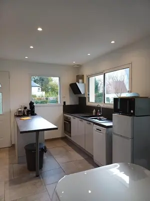 Cuisine ou kitchenette dans l'établissement Maison détente