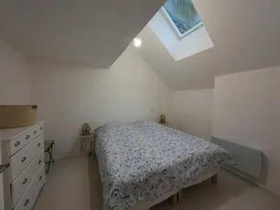 Un ou plusieurs lits dans un hébergement de l'établissement la maison bleue