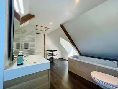 Un ou plusieurs lits dans un hébergement de l'établissement Le Gite de la Fontaine - Spacious house