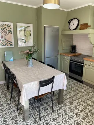 Cuisine ou kitchenette dans l'établissement Aux Petits Bonheurs