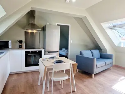 Cuisine ou kitchenette dans l'établissement L'Ermitage Smart