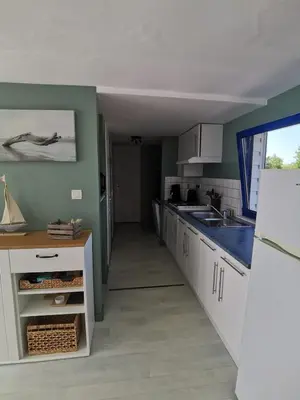 Cuisine ou kitchenette dans l'établissement Chalet familial L'Abri Côtier