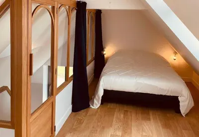 Un ou plusieurs lits dans un hébergement de l'établissement Maison Yodée