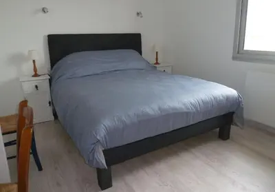 Un ou plusieurs lits dans un hébergement de l'établissement HolidayVilla50mFromBeach VillaDeVacancesPlage à50m