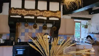 Cuisine ou kitchenette dans l'établissement Chambre Mer'veille proche Mont Saint Michel