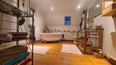 Coin salon dans l'établissement Chambre Mer'veille proche Mont Saint Michel