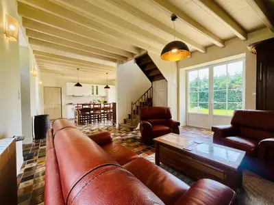Coin salon dans l'établissement Le Clos du Haut Gallion An authentic haven of peace