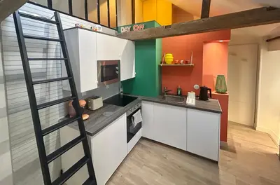 Cuisine ou kitchenette dans l'établissement Le Refuge Saint Sauveur
