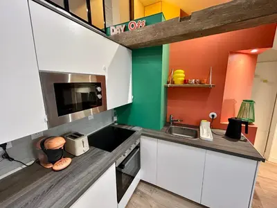 Cuisine ou kitchenette dans l'établissement Le Refuge Saint Sauveur