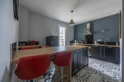 Cuisine ou kitchenette dans l'établissement Le Soleil de Saint Patrice