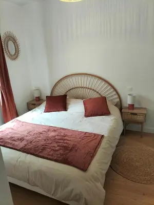 Un ou plusieurs lits dans un hébergement de l'établissement Appartement avec cour privée