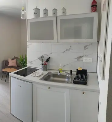 Cuisine ou kitchenette dans l'établissement Appartement Le doux Viking, balcon & parking privé proche Zénith Caen