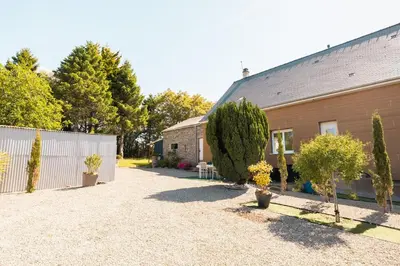 Jardin de l'établissement Maison spacieuse avec jardin - 10 min plage