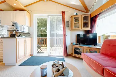 Cuisine ou kitchenette dans l'établissement Mobile Home - 700m de la plage