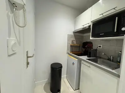 Cuisine ou kitchenette dans l'établissement Appartement CAEN Saint Sauveur