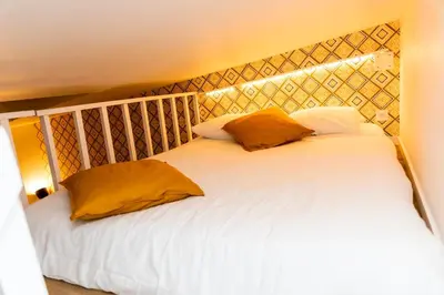 Un ou plusieurs lits dans un hébergement de l'établissement 4-person apartment, city center