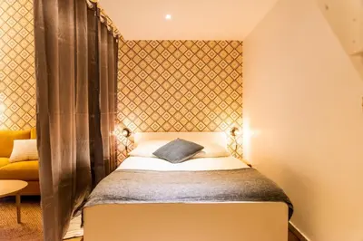 Un ou plusieurs lits dans un hébergement de l'établissement 4-person apartment, city center