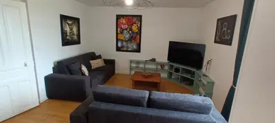 Télévision ou salle de divertissement dans l'établissement Villa du homard bleu