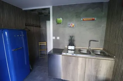 Cuisine ou kitchenette dans l'établissement Maison 8 personnes localisée au cœur de Sainte-Marie-du-Mont