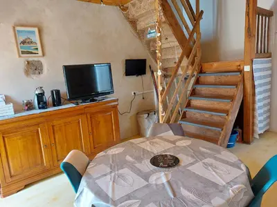 Télévision ou salle de divertissement dans l'établissement Gite Bourg HYENVILLE 2 etoiles