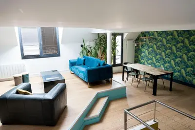Coin salon dans l'établissement Loft pour 2 au port de Caen