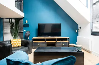 Télévision ou salle de divertissement dans l'établissement Loft pour 2 au port de Caen