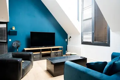 Télévision ou salle de divertissement dans l'établissement Loft pour 2 au port de Caen