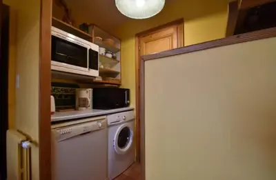 Cuisine ou kitchenette dans l'établissement Gîte du Netz
