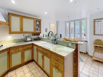 Cuisine ou kitchenette dans l'établissement Le patio des moussaillons 8 personnes