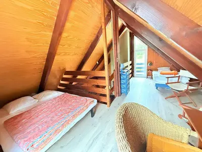 Un ou plusieurs lits dans un hébergement de l'établissement Le chalet des câlins canins
