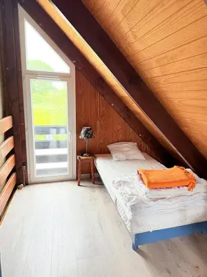 Un ou plusieurs lits dans un hébergement de l'établissement Le chalet des câlins canins