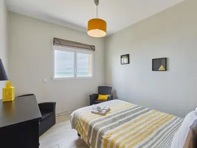 Un ou plusieurs lits dans un hébergement de l'établissement Holiday Home La Surprise by Interhome