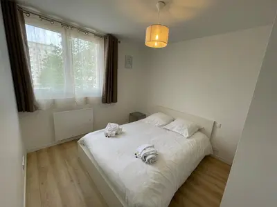 Un ou plusieurs lits dans un hébergement de l'établissement Plein coeur de Caen, Emeraude
