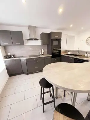 Cuisine ou kitchenette dans l'établissement La Maison de Mélou