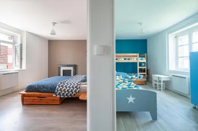 Un ou plusieurs lits dans un hébergement de l'établissement Le Logis d'Allonne - 10min de la Plage