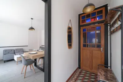 Coin salon dans l'établissement Le Logis d'Allonne - 10min de la Plage