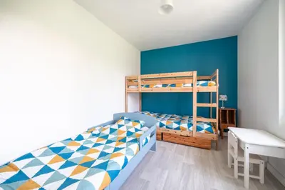 Un ou plusieurs lits dans un hébergement de l'établissement Le Logis d'Allonne - 10min de la Plage