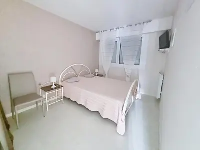 Un ou plusieurs lits dans un hébergement de l'établissement Appartement cosy 4 pers proche mer avec parking - FR-1-746-34