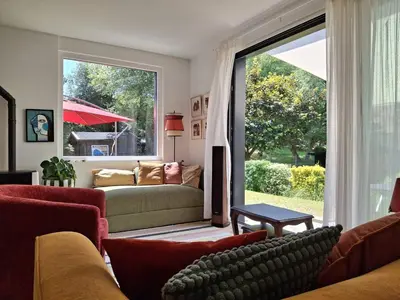 Coin salon dans l'établissement Maison familiale 3 chambres à 300m de la plage - FR-1-788-81