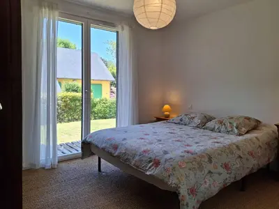 Un ou plusieurs lits dans un hébergement de l'établissement Maison familiale 3 chambres à 300m de la plage - FR-1-788-81