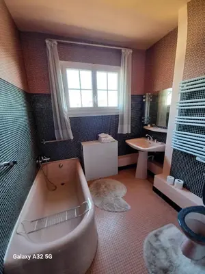 Salle de bains dans l'établissement Au bon accueil de Sartilly