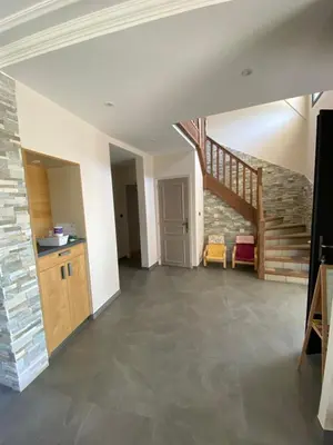 Télévision ou salle de divertissement dans l'établissement La maison normande