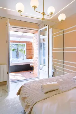 Un ou plusieurs lits dans un hébergement de l'établissement Casa Gauda, Jacuzzi, détente et sérénité