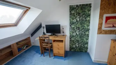 Télévision ou salle de divertissement dans l'établissement La villa des vikings